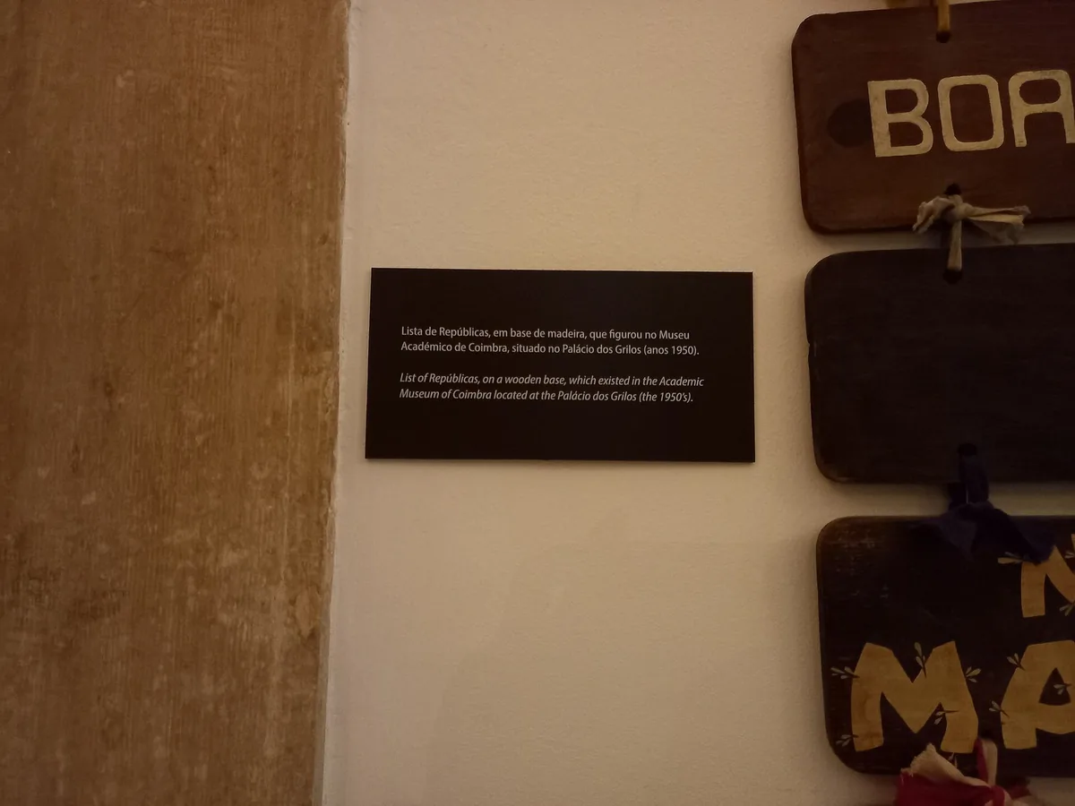 Black student capes and faculty ribbons displayed at the Museu Acad&eacute;mico, Coimbra