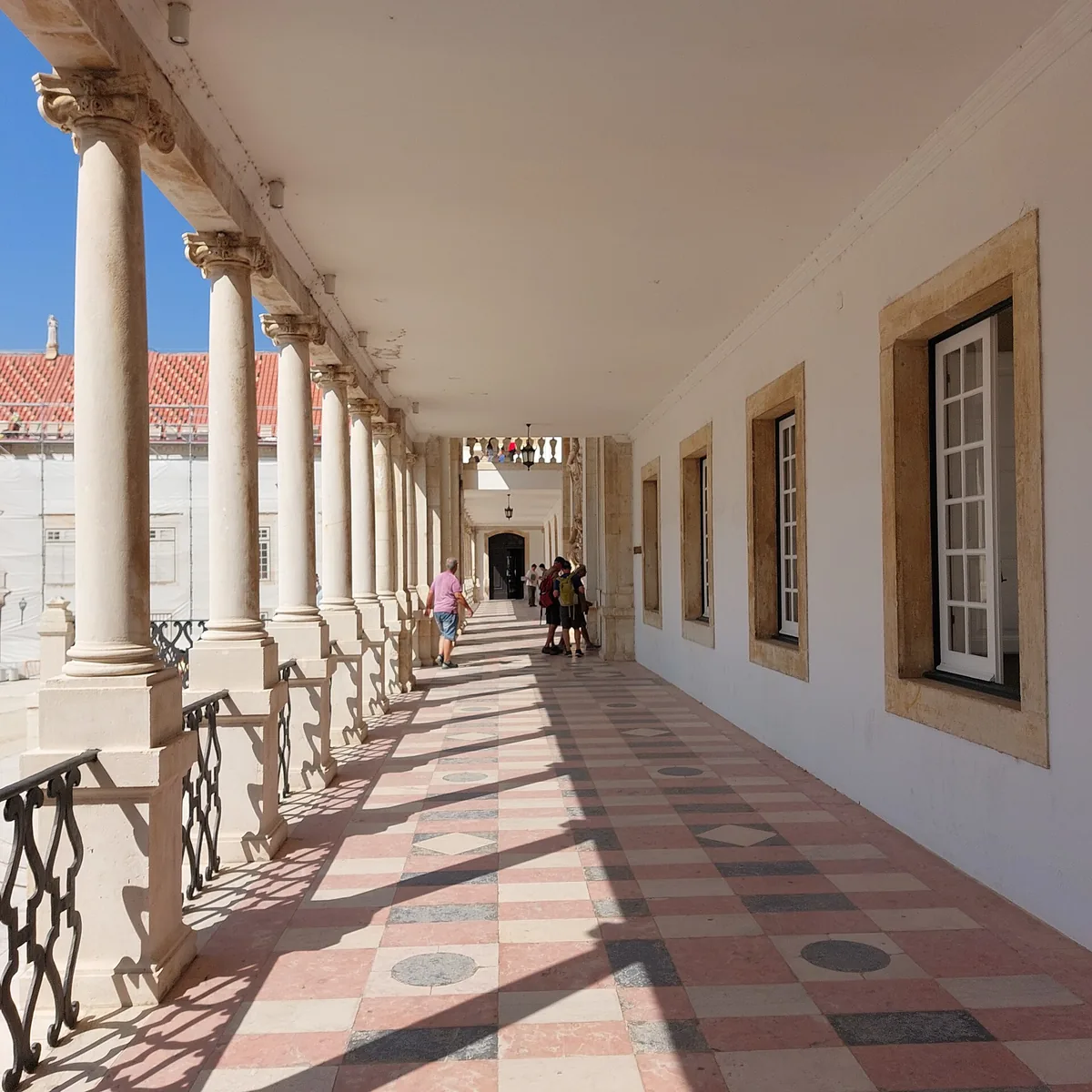 The colonnaded south front of the Paço das Escolas, the courtyard you cross to reach the library and the prison beneath it