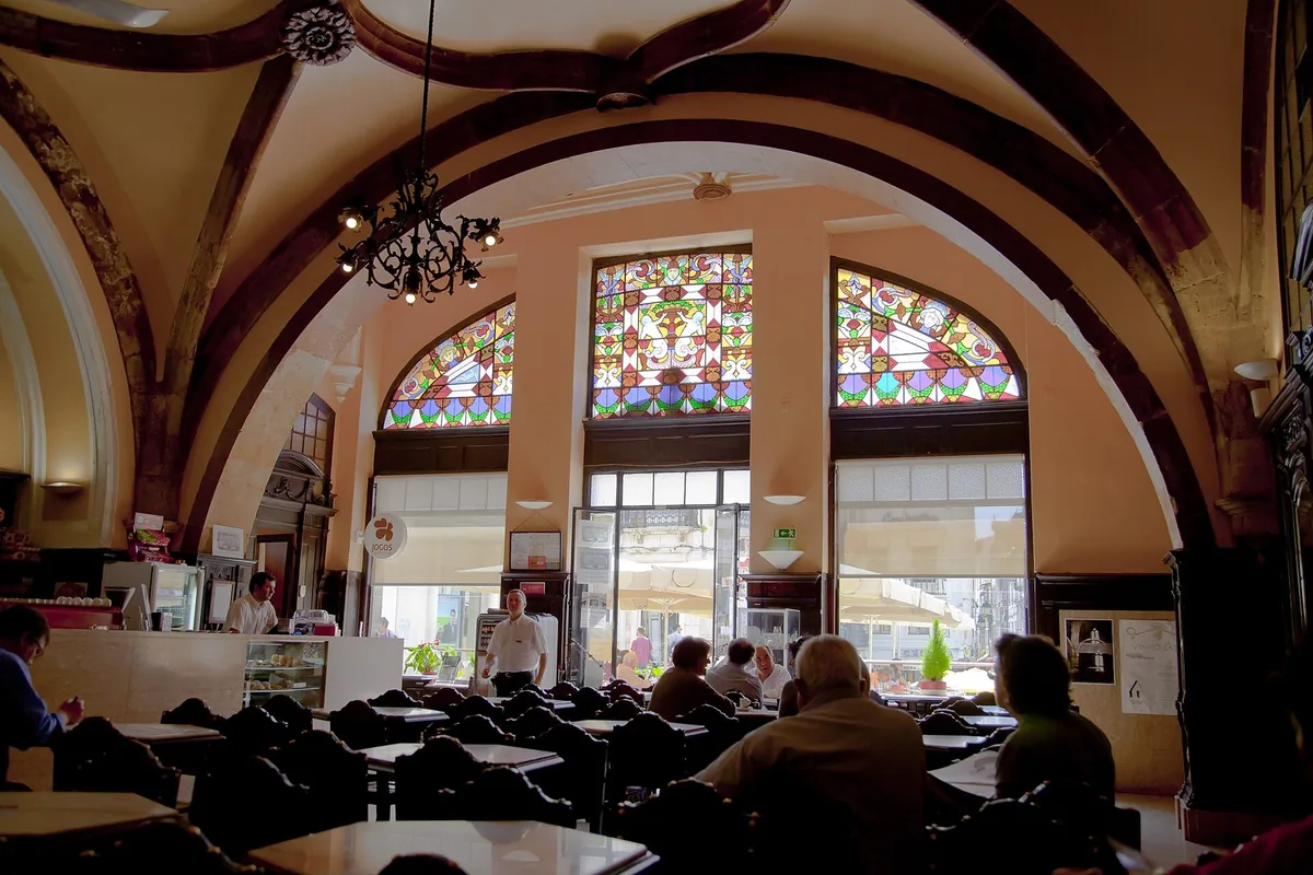 The vaulted interior of Caf&eacute; Santa Cruz in the former church of S&atilde;o Jo&atilde;o, Coimbra
