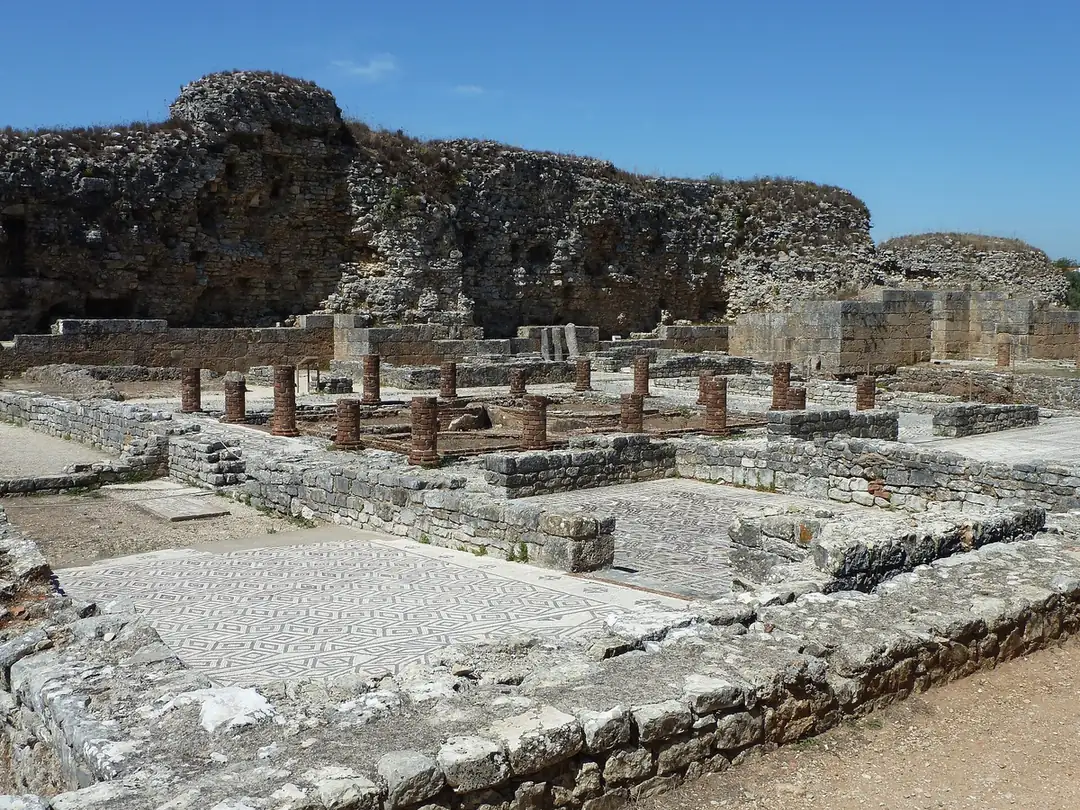 The mosaic floors and colonnaded garden of the Casa dos Repuxos at Con&iacute;mbriga