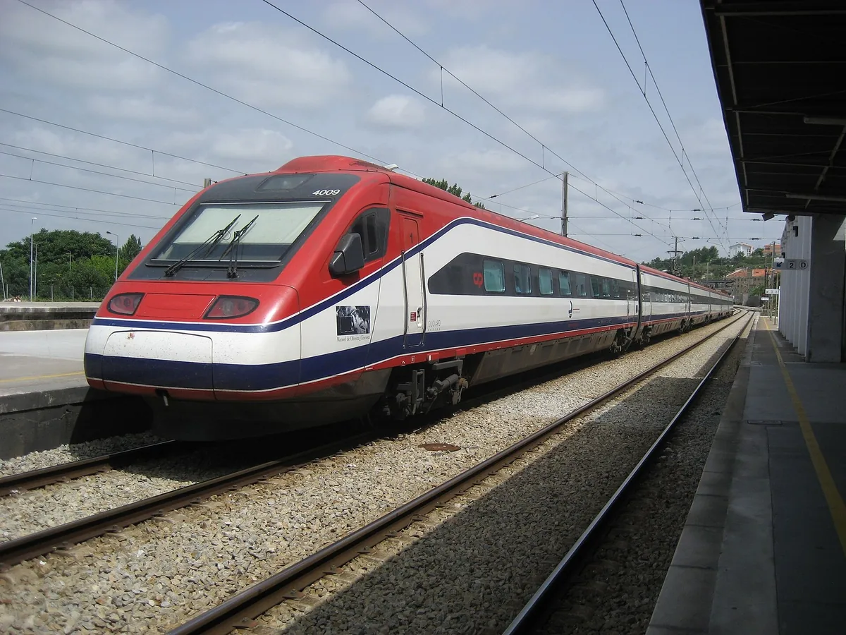 An Alfa Pendular train on the Linha do Norte at Coimbra-B