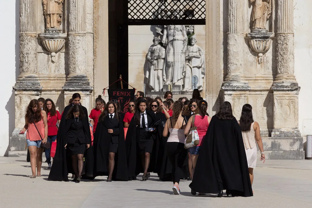 Freshmen parading in costume during the Festa das Latas in Coimbra