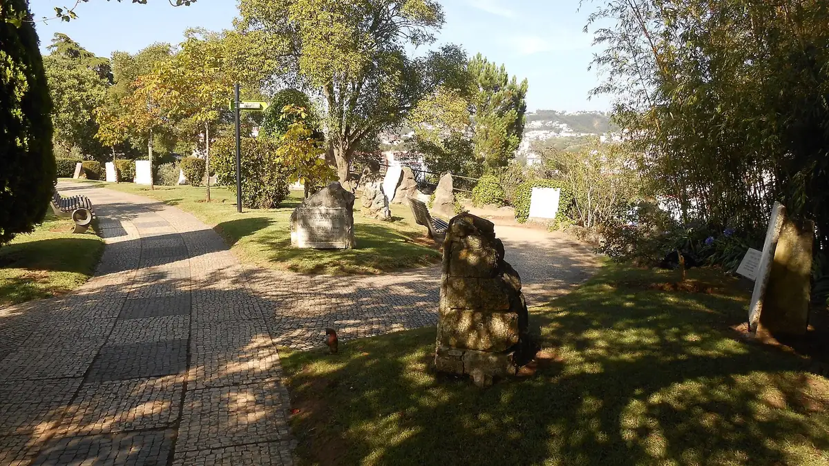 Verse plaques set into the rock faces of the Penedo da Saudade garden, Coimbra