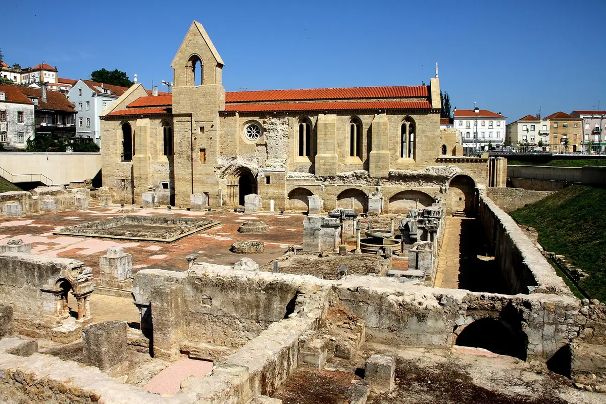 Excavated Gothic nave and cloister walls of the Mosteiro de Santa Clara-a-Velha beside the Mondego, Coimbra