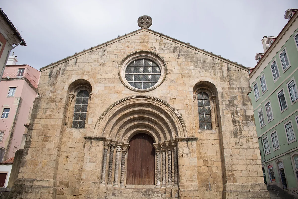 The Romanesque west front of the Igreja de S&atilde;o Tiago on Pra&ccedil;a do Com&eacute;rcio, Coimbra