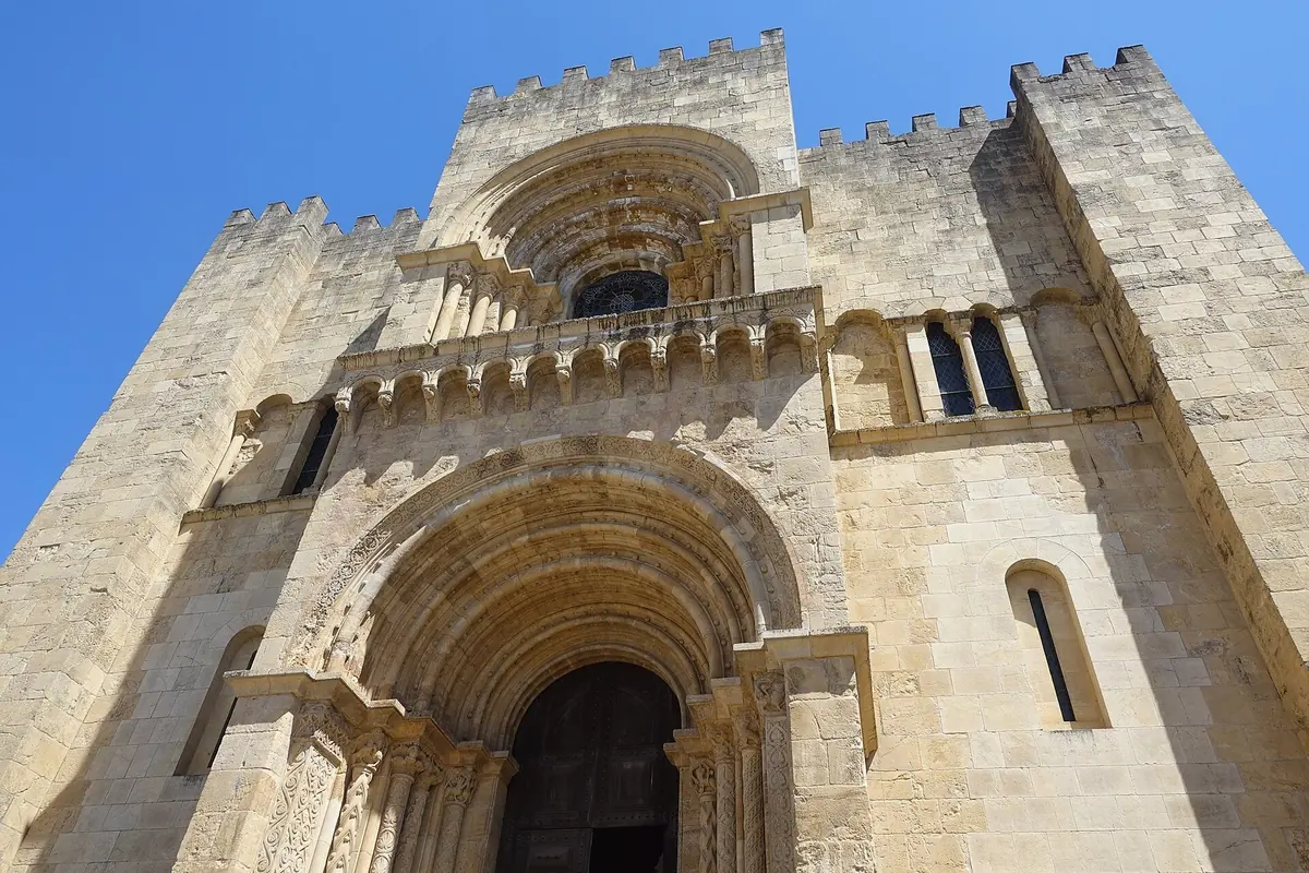 The fortress-like Romanesque west front of the Sé Velha, Coimbra